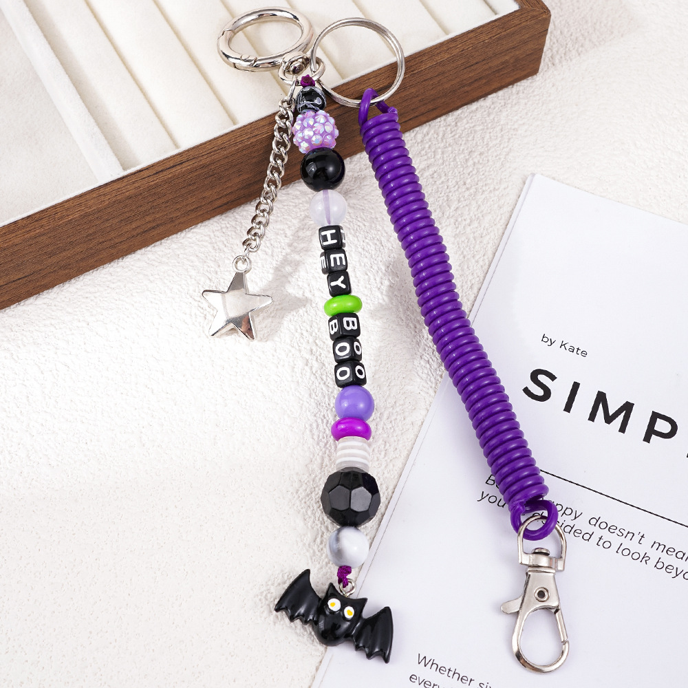 Nuevos productos transfronterizos creativos de letras de color cuerdas trenzadas llavero amor dibujos animados accesorios de diseño bolsos colgantes