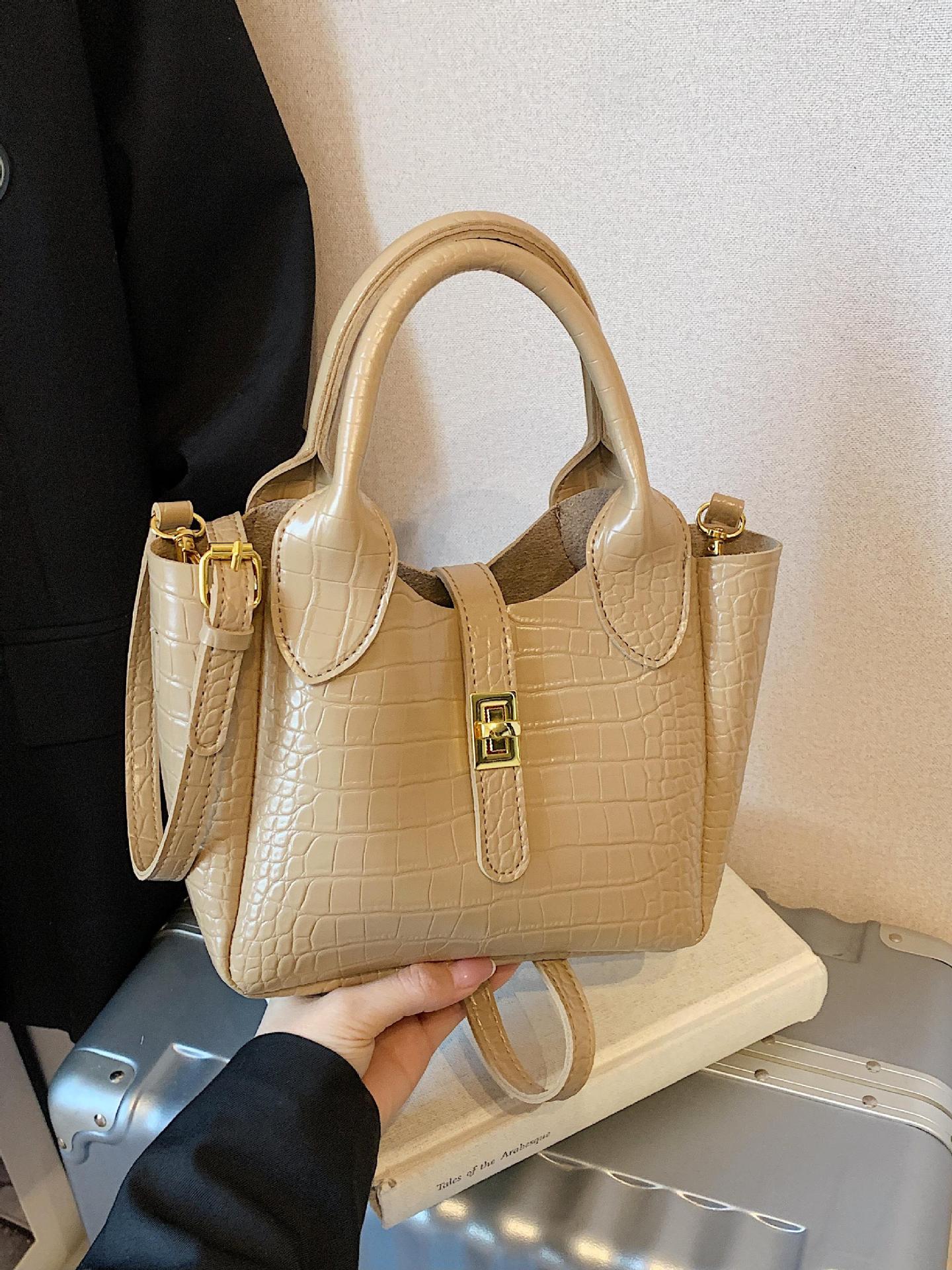 Comercio exterior super fuego patrón de cocodrilo llevar a mano bolso de cubo mujer 2025 nuevo bolso de hombro de viaje de moda bolso de mensajero de todo fósforo