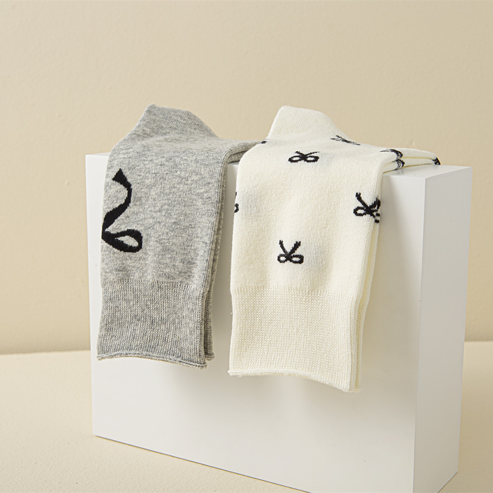 Calzini con fiocco, calzini da donna, calzini tubolari, jacquard, Corea del Sud, personalizzati, autunnali e invernali, versatili, assorbenti del sudore, carini, calzini in cotone bianco e nero_voghion.com