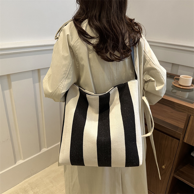 Bolsa de lona de gran capacidad, bolsa de hombro a rayas de mujer, texturas extranjeras, bolsas de compras coreanas, bolsas de tela portátiles.