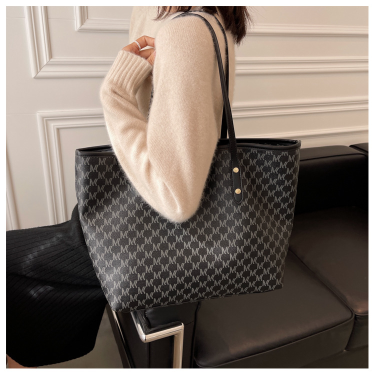Bolsos de textura avanzada, bolsas de hombro con letras impresas transfronterizas, nichos, bolsas de mano retrógradas para viajar