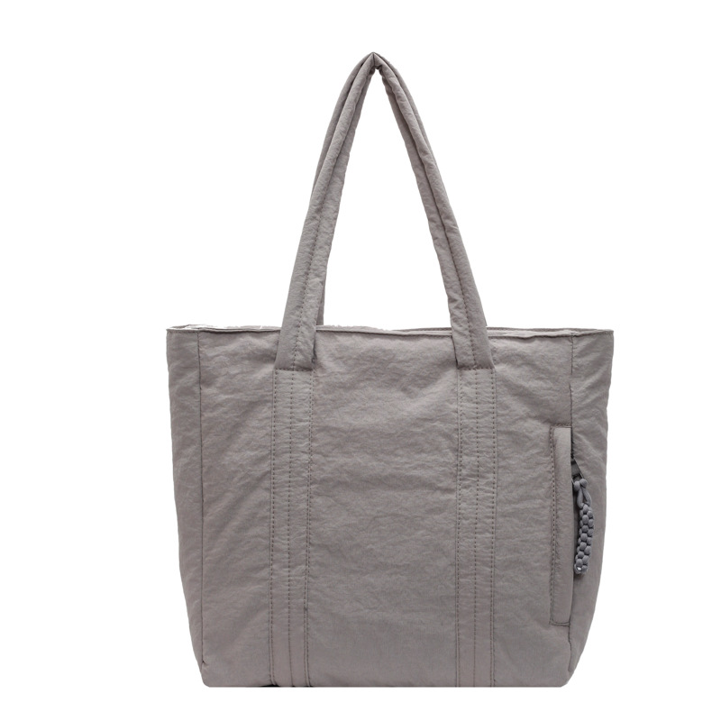 Bolso de nailon de gran capacidad para mujer 2024 nuevo otoño e invierno todo-fósforo bolso de la compra de un solo hombro bolso de viaje de clase simple