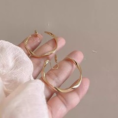 ツイストサークル蚊よけイヤークリップ、フェミニンでファッショナブルなコールドスタイルイヤリング、シンプルで誇張されたノンホールイヤークリップイヤリング