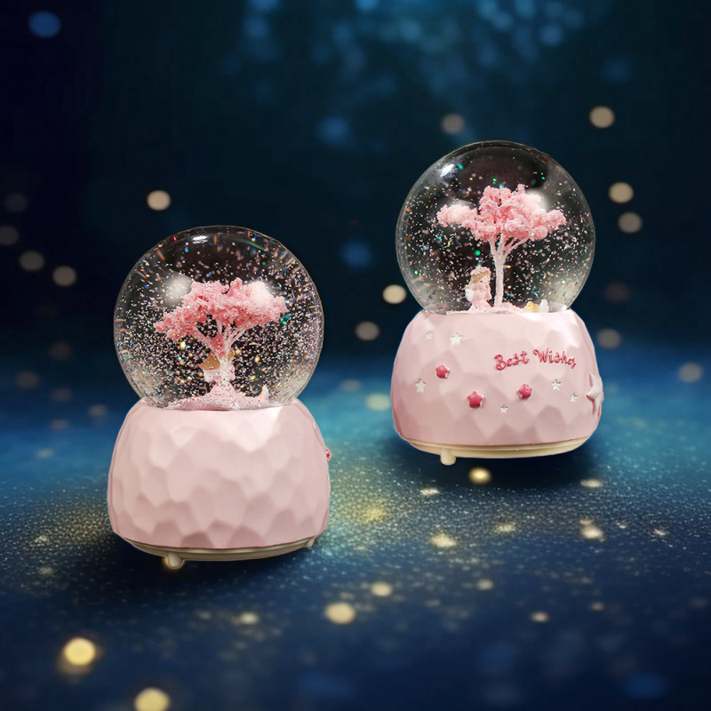 夢の雪の水晶の玉の机はオルゴールのオルゴールの女の子の誕生日の子供の六一子供の日のプレゼントを並べます。|undefined