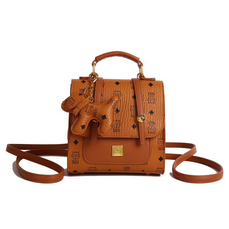 Mochila de moda coreana para mujer, bolso de mensajero con estampado de moda ringge de estilo occidental, bolso de viaje con colgante de cachorro lindo