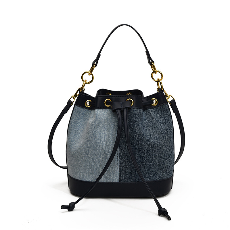 2025 otoño y invierno nuevo estilo coreano nicho bolso de cubo de agua mujer moda bolso de correa de color contraste de moda bolso de hombro