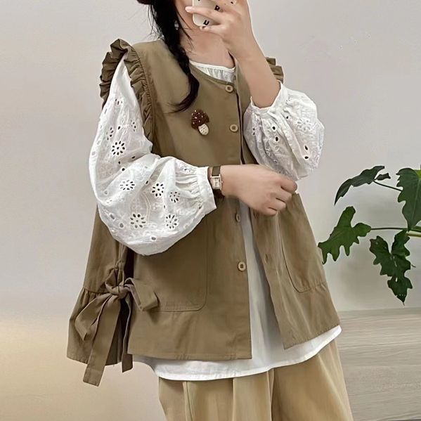 Japanese-style forest-inspired cotton vest with ruffled trim and tie detailing, new autumn style for women, featuring 3D mushroom-shaped embellishments for a youthful and layered look.