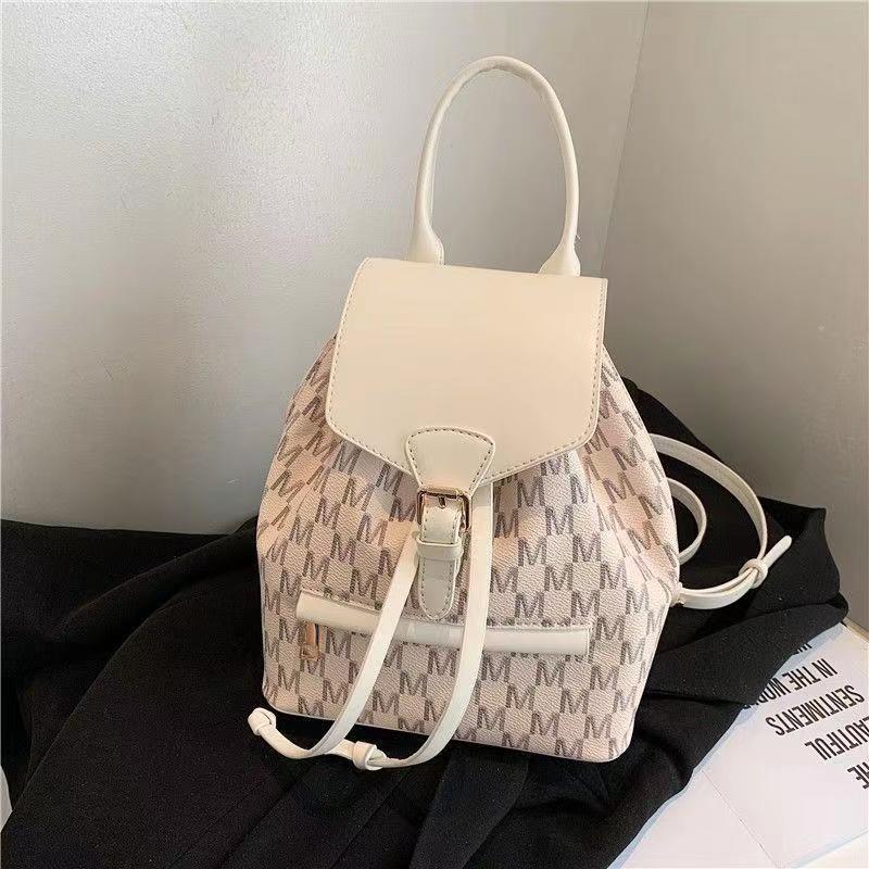 Mochila de hombro impresa de alta calidad para mujeres 2023 nueva moda en línea rojo universal fuera de gran capacidad explosiva