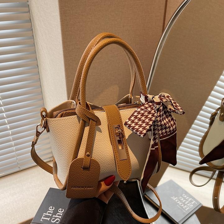 Comercio exterior explosivo bolso de cestas de verduras de mano mujer 2025 nuevo bolso de cinturón simple estilo coreano bolso de cubo de nicho