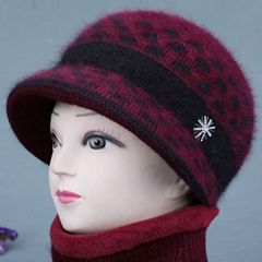 冬の女性の中高年のお母さんの毛糸の帽子のおばあさんのベルベットの保温は厚いアヒルの舌のニットの帽子の老人の帽子を厚くします。