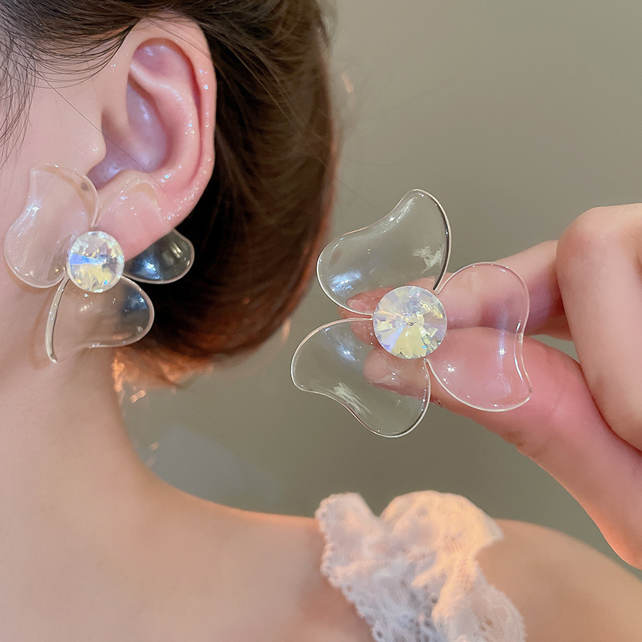 Pendientes de flor de lazo elegante de súper hada de plata Pendientes de moda de lujo ligero francés Pendientes de todo fósforo dulce de estilo literario