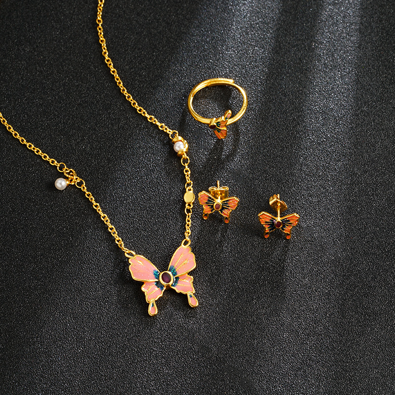 Vietnam Shajinshan Wild Tea Butterfly Collar Moda femenina Advanced Sense Ventana vacía Esmalte Butterfly Juego exquisito de tres piezas con accesorios