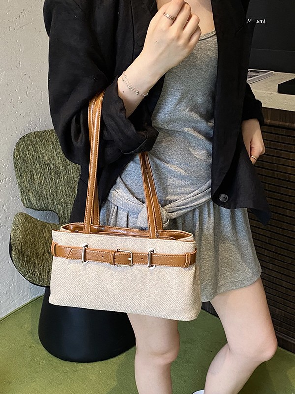 Bolso de mano de diseño de nicho para mujer 2025 verano nueva costura de moda bolso de hombro de color de contraste bolso de viaje coreano