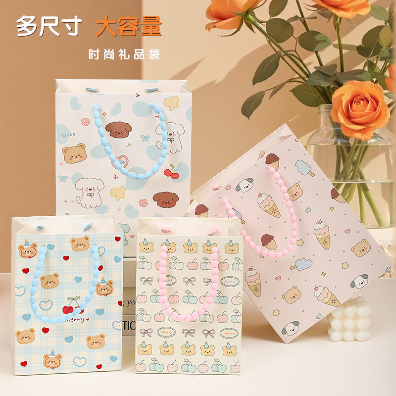 Nuevas bolsas de regalo exquisitas con diseño de animales de dibujos animados en relieve con cuerda de burbujas, directamente del fabricante, para el Día de la Mujer y San Valentín.