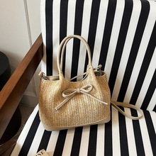 包邮夏季小众蝴蝶结草编包简约轻奢度假风手提单肩斜挎包托特包女