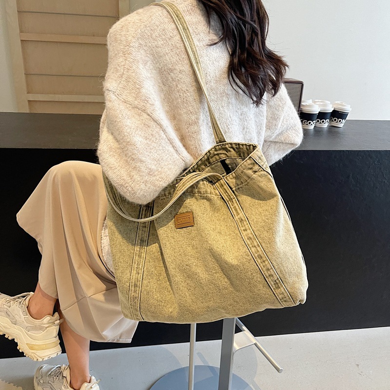 2024 nuevo bolso de hombro de mezclilla de gran capacidad bolso de compras bolso de ocio de arte de nicho al por mayor