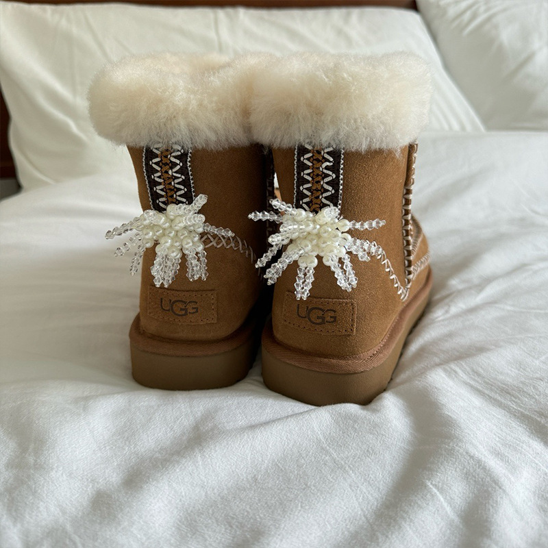 Botas de nieve botón de invierno nuevo arco de perlas zapatos de fichaje flor zapatos deportivos decoración mujer