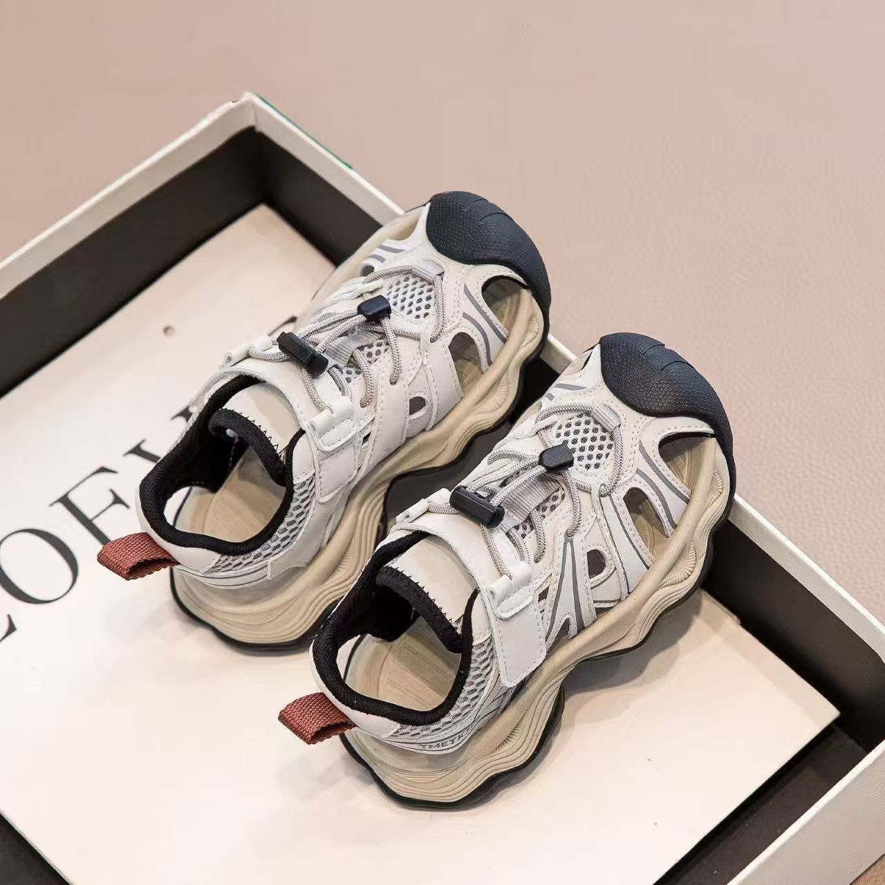 2026 verano nuevos niños zapatos casuales transpirables de malla sandalias deportivas con suela suave zapatillas individuales image 4