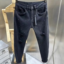 外贸弹力刺绣紧身牛仔裤破洞柳钉金属装饰夜店街潮黑色小脚裤男