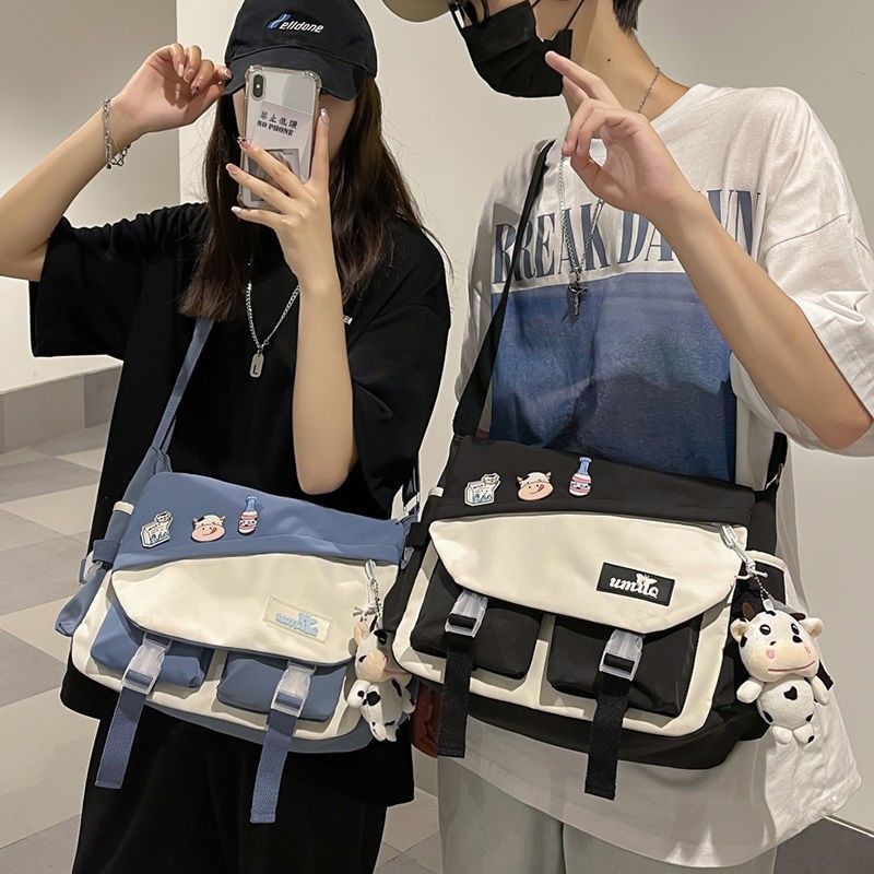 Bolso de hombro de moda para hombres, bolso de hombro para mujeres japonesas de gran capacidad, bolso de estudiantes casuales, bolso de cartero para hombres