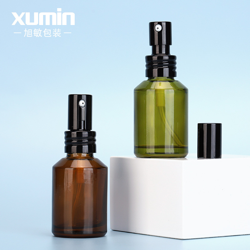 Xumin embalaje 30ml marrón botella de loción de pequeña capacidad botella de líquido de esencia de vidrio verde botella de bomba de presión de sub-embalaje
