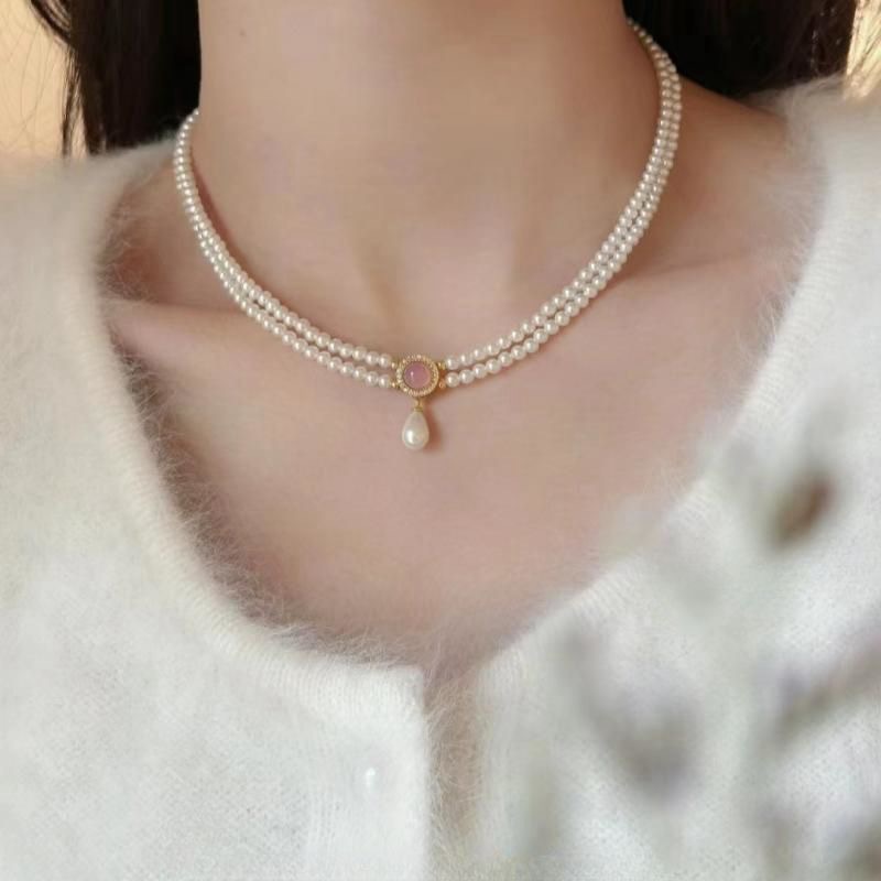 Simple Style Classic Style Solid Color Imitation Pearl Alloy Beaded Women's Layered Necklaces Necklace display picture 5