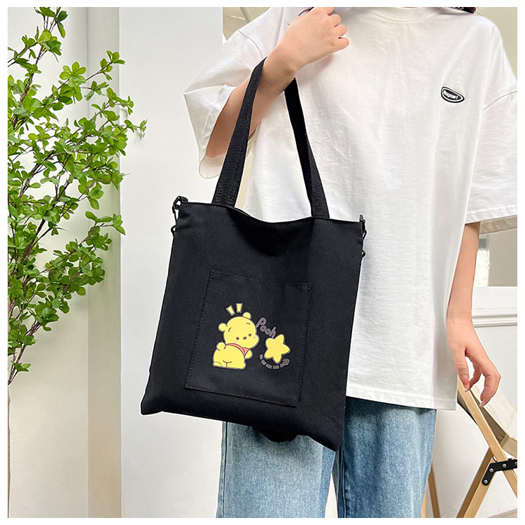 New high-appeartion-level hand-held tote bags are selling well, large-capacity single-shoulder crossbody bags, and wholesale canvas bags for junior and senior high school students full figure