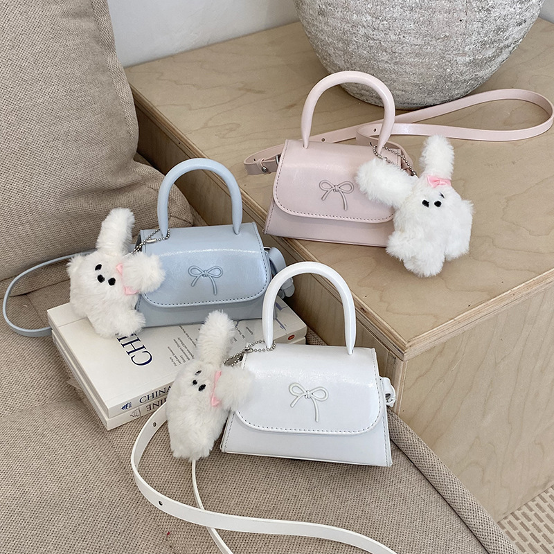 Bolsos infantiles transfronterizos dulces lindos arcos bolsos de mano de niña mini oso colgante bolsos de hombro