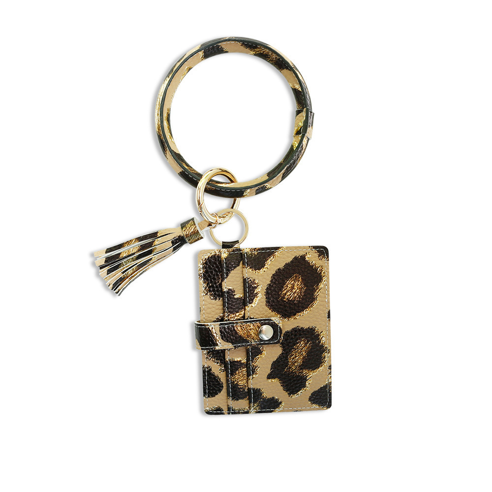 Amazon nuevo año de la serpiente muñequera PU cuero gran capacidad tarjetero clave monedero pulsera llavero colgante