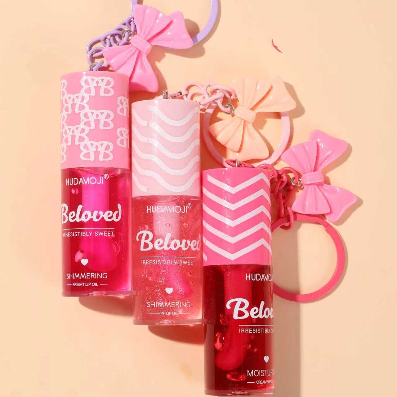 Transfronterizo exclusivo para ondas tropicales llaver de arco de calor decoloración labial aceite hidratante brillante polvo de espejo tierno brillo labial