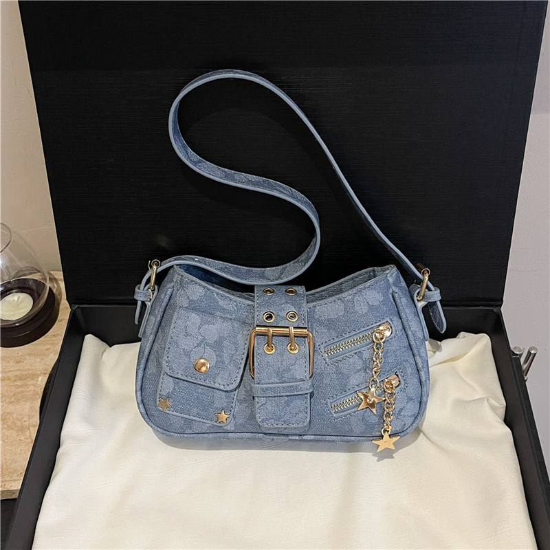 Dulce y fresco bolso de axila de chica caliente 2025 verano nuevo bolso femenino diseño de nicho bolso de hombro flor oscura bolso de mensajero marea