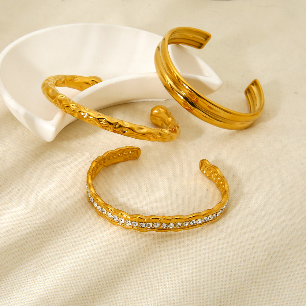 18g Weight 0.03µm-0.05µm Gold Plating Thickness PVD Coated Gold Plating Process 18K Real Gold Plated Plating Material Zircon Inlay Material Bangle Classification 1 Piece Quantity Casual, Holiday, Daily, Street Occasion 304 Stainless Steel Material Geometric Pattern Women's Gender Retro, Classic Style Style Mixed Metal, Plating, Hammered Craft Retro Classic Style Geometric 304 Stainless Steel 18K Gold Plated Bangle In Bulk 14