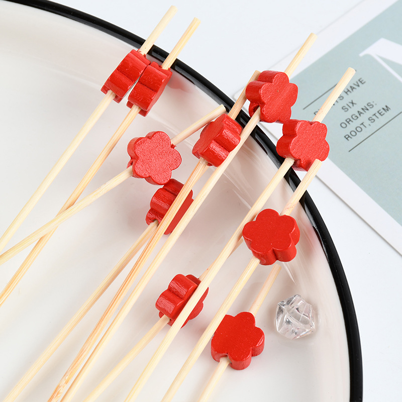 Fábrica de suministro desechable flores rojas horquilla de fruta palillos de dientes de dibujos animados palillos de frutas palillos de dientes artísticos palillos de bambú