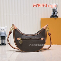 直接供給クロスボーダー新しいクラシック老眼デニムピーバッグキャンバスと牛革ムーンバッグシングルショルダークロスボディレディースバッグ