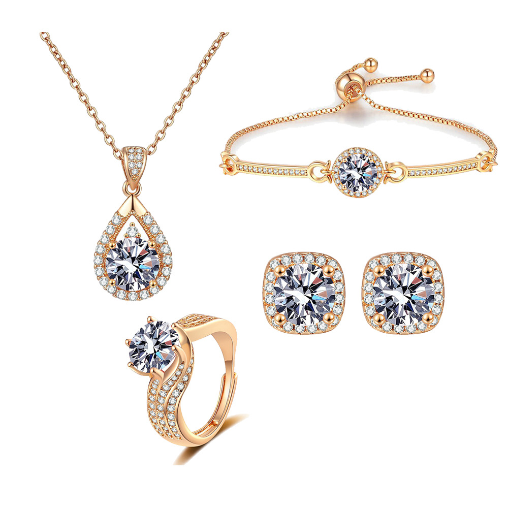 Fashion Jewelry Sets Cross-border Korean-style Elegant Simple Champagne Gold Set With Rose Motif Square Bag, Ring, Bracelet, And Earrings_voghion.com