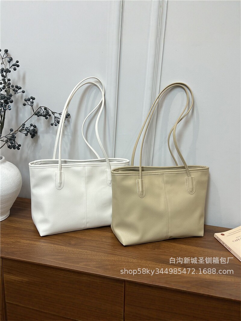 2026 nueva bolsa de gran capacidad de moda de mujer alta textura bolsa de hombro de viaje simple bolsa de mano universal image 4