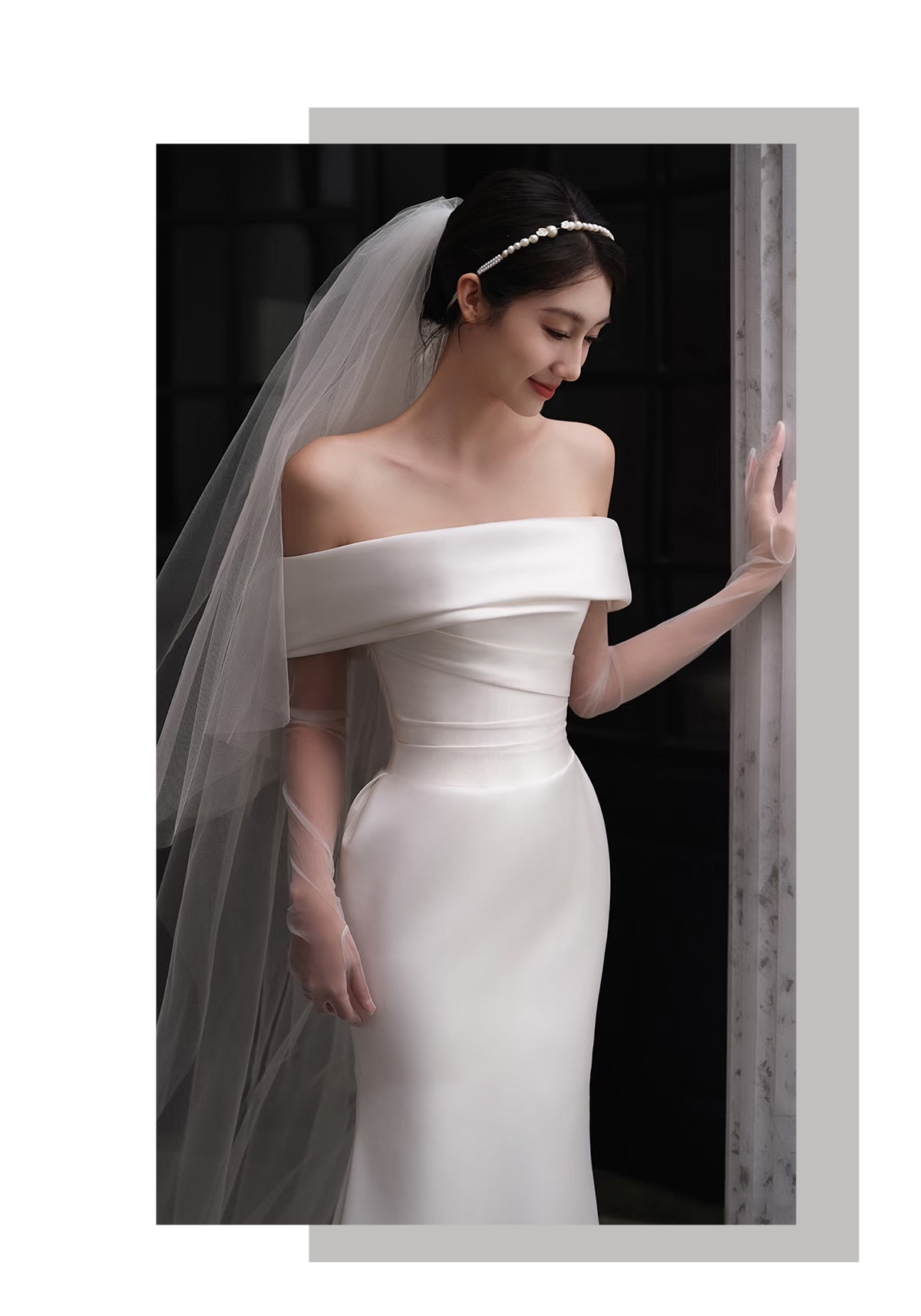 Elegante abito da sposa a sirena in raso con scollatura a spalle scoperte e strascico staccabile: abito da sposa senza tempo per spose moderne_voghion.com