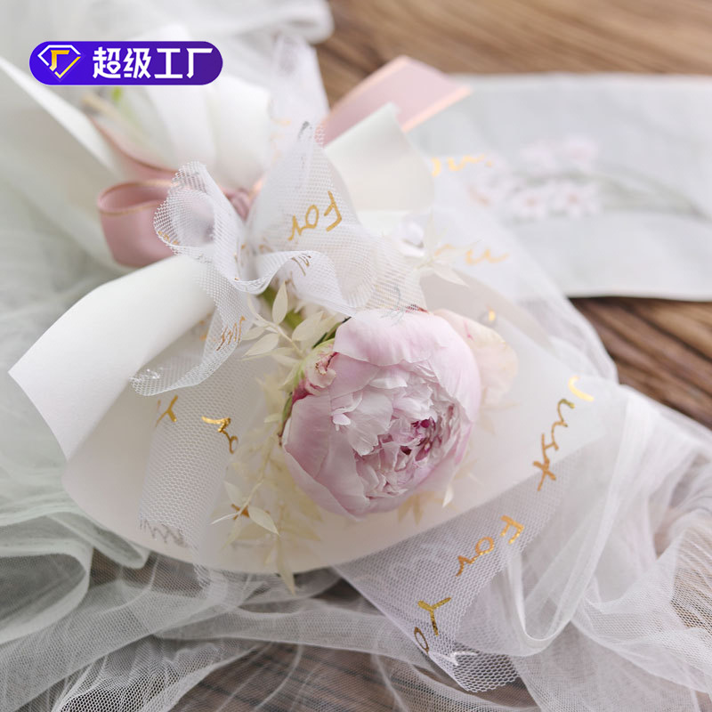 Nueva celebridad en línea hilo inglés creativo dorado flor neta material de embalaje de la tienda de flores de moda bolsa de suministros al por mayor