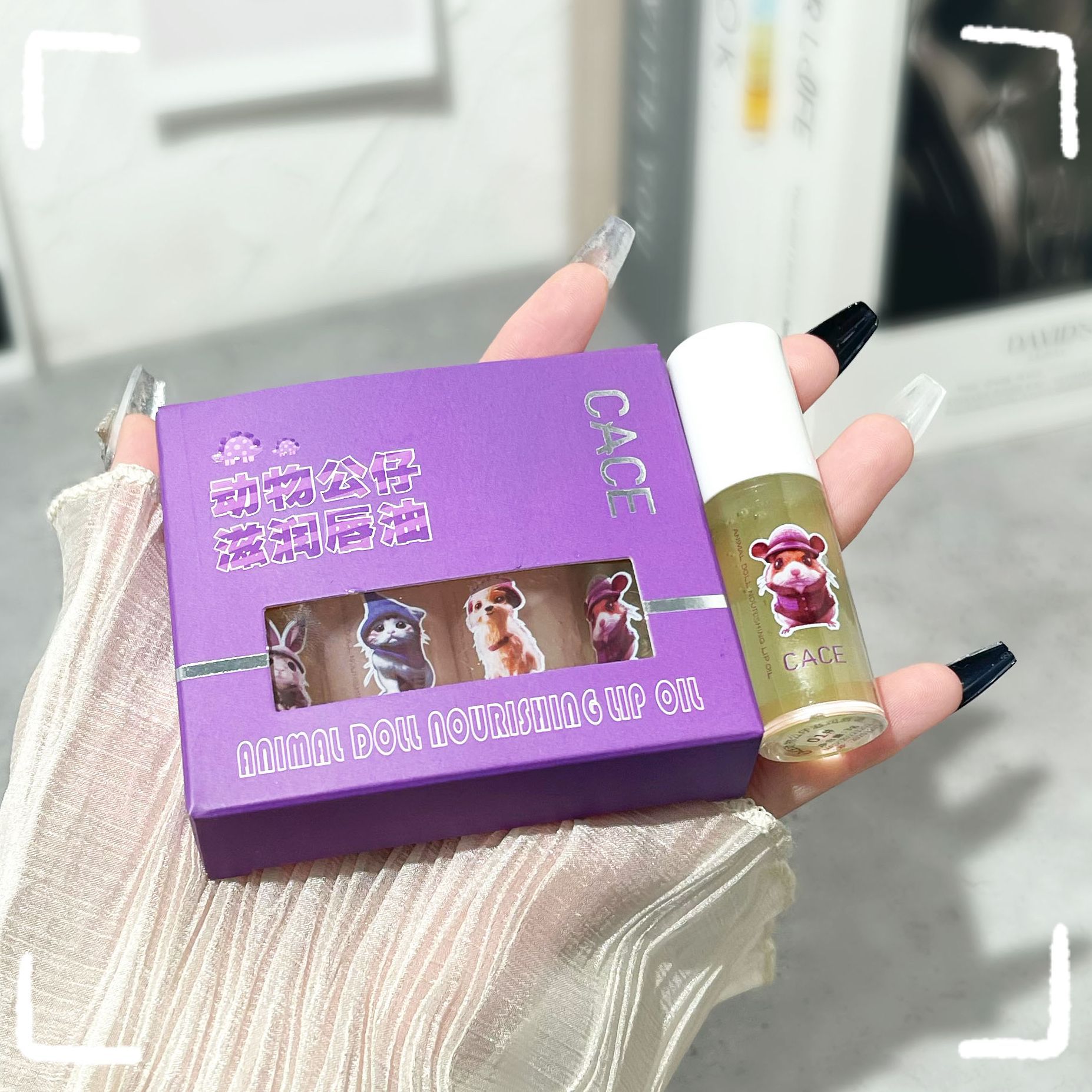 CACE Animal Doll Lip Oil Moisturizes and hydrates, nourishing lip lotion protects lips, reduces lip lines, and makes lips plump. Cross-border wholesale undefined