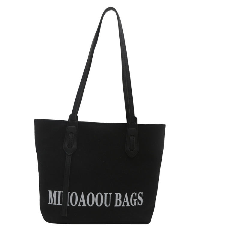 Bolsa de gran capacidad para mujeres 2024 otoño nuevo estilo de bolsa de lona universal bolso de hombro de viaje de estudiantes universitarios bolso de clase