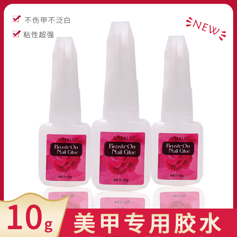 Suministro directo transfronterizo pegamento de uñas 10g con cepillo pieza de uñas falsas rhinestone accesorios de pegamento de esmalte de uñas para salón de uñas