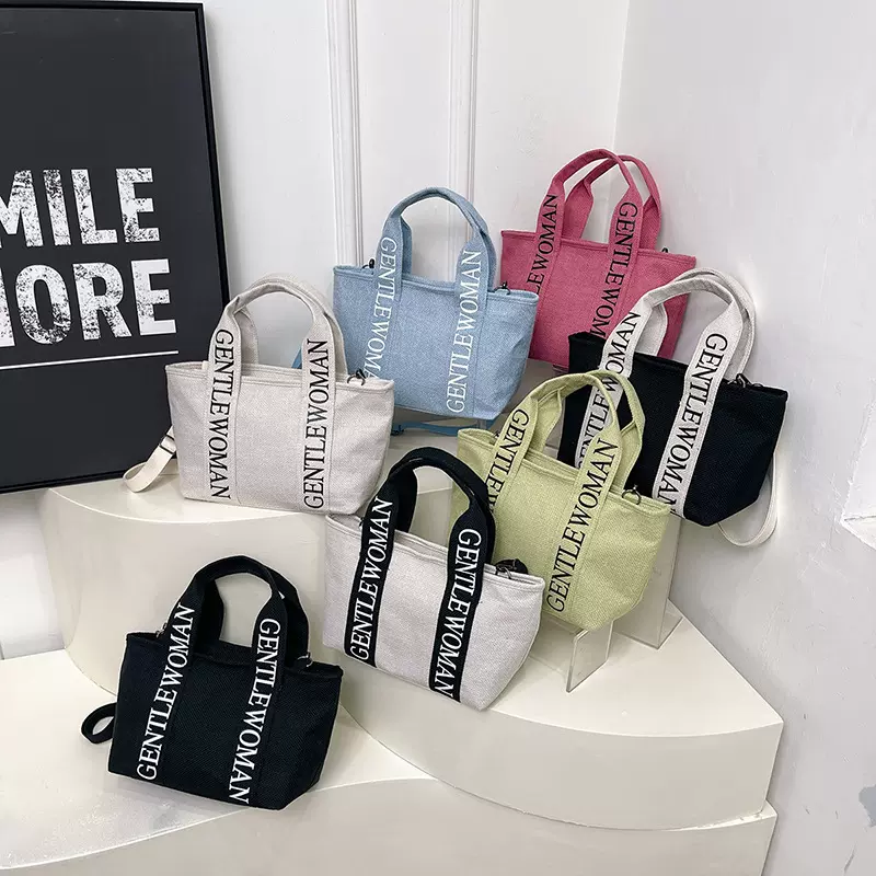 休闲通勤大容量帆布包包女2025新款轻便百搭单肩包超火手提托特包