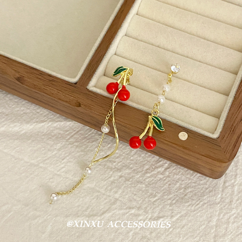 Demi-season red asymmetrical small design long earrings with tassels