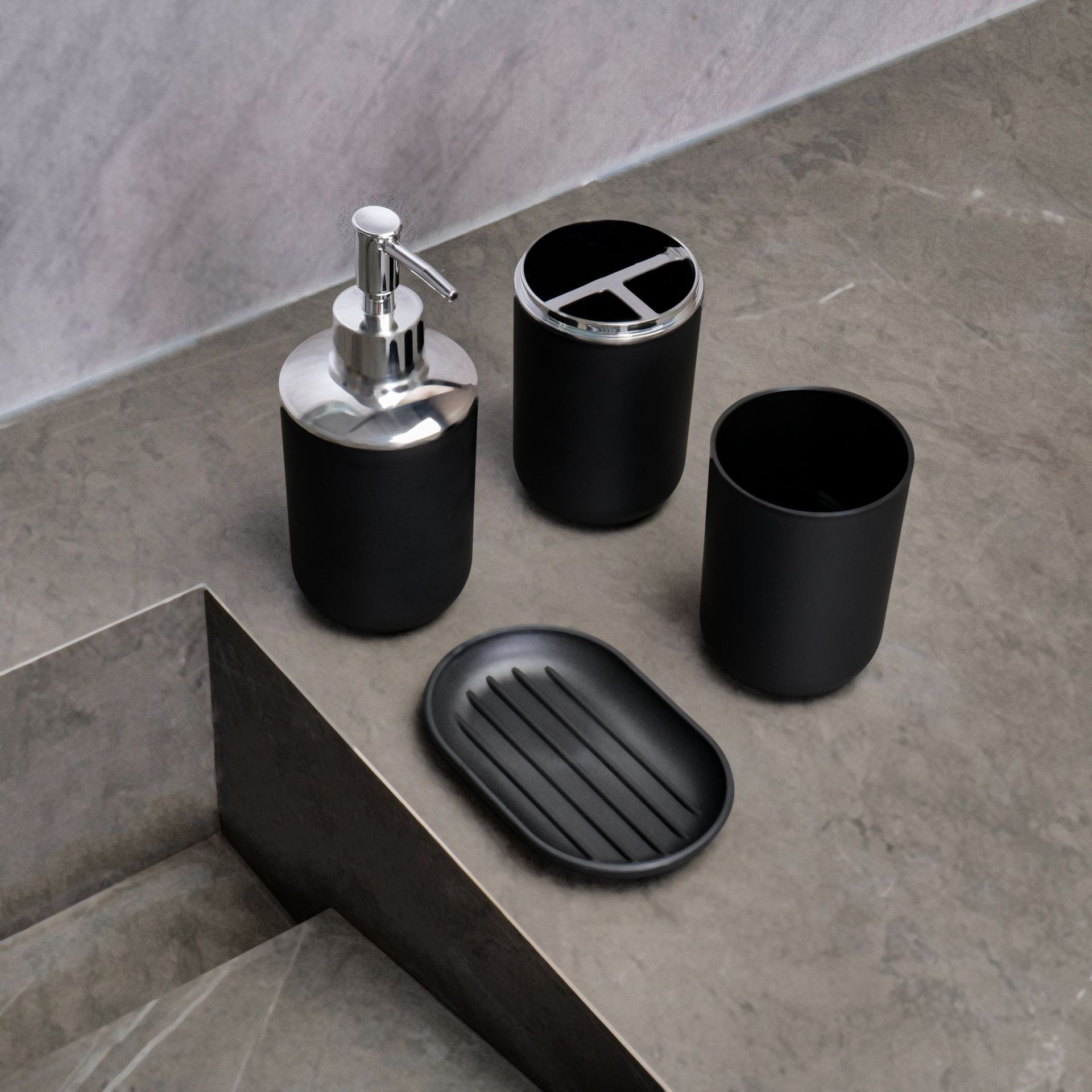 Baño transfronterizo de cuatro piezas Baño de hotel Juego de lavado Cepillado Taza de enjuague bucal Bomba de loción Viento de lujo ligero Ventas de fábrica