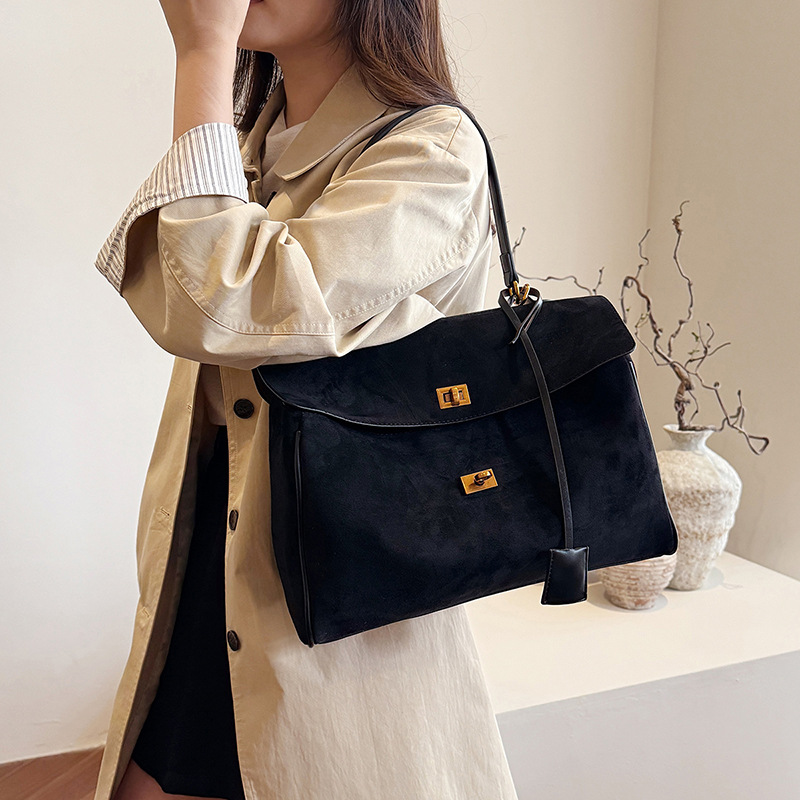 Bolsa de mano esmerizada transfronteriza alta sensación de bolso especial para mujeres otoño y invierno 2025 nuevo estilo universal bolso de hombro bolso de viaje