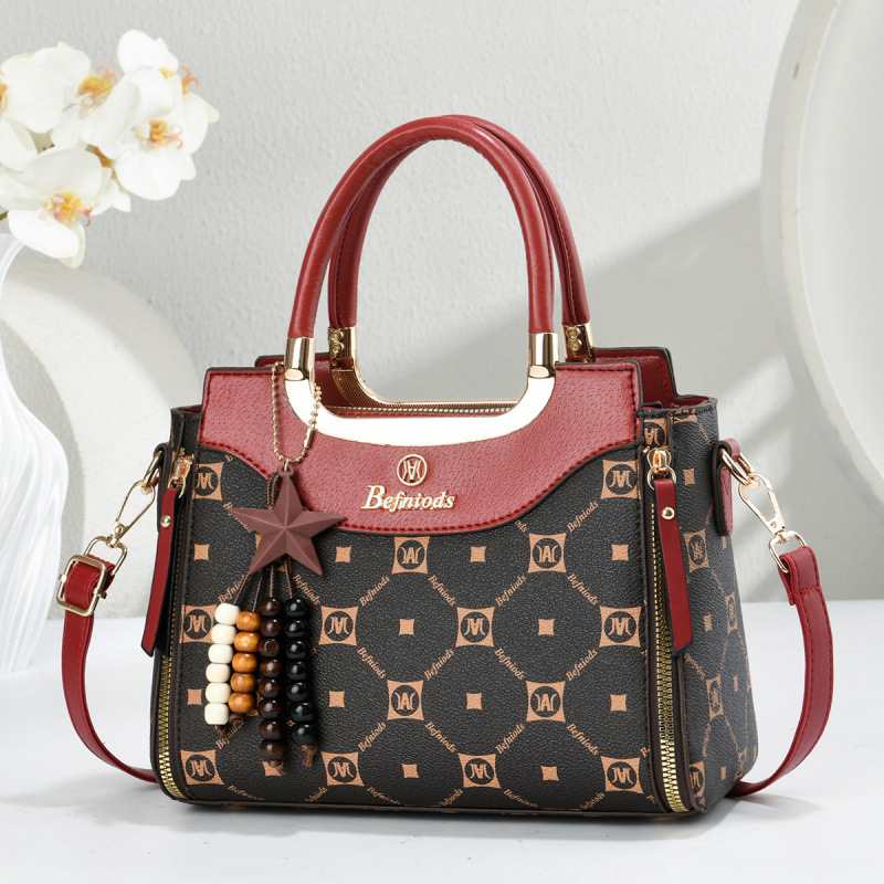 Bolsas de mano de moda casuales con estrellas colgantes, bolsas de hombro, bolsas de transporte aéreo, bolsas de mujer transfronterizas
