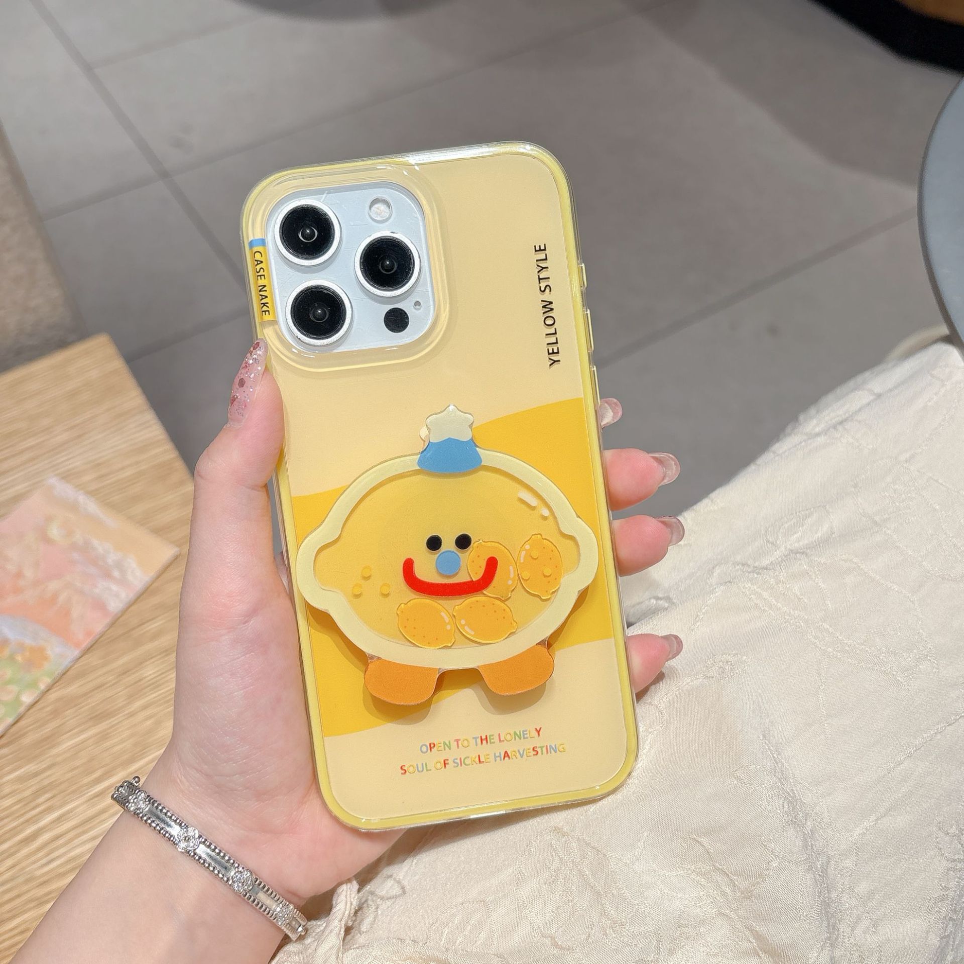 Simple creativo lindo limón cara sonriente aplicable 16ProMax funda para teléfono móvil 15Pro dibujos animados 14/13 nuevo 15PM