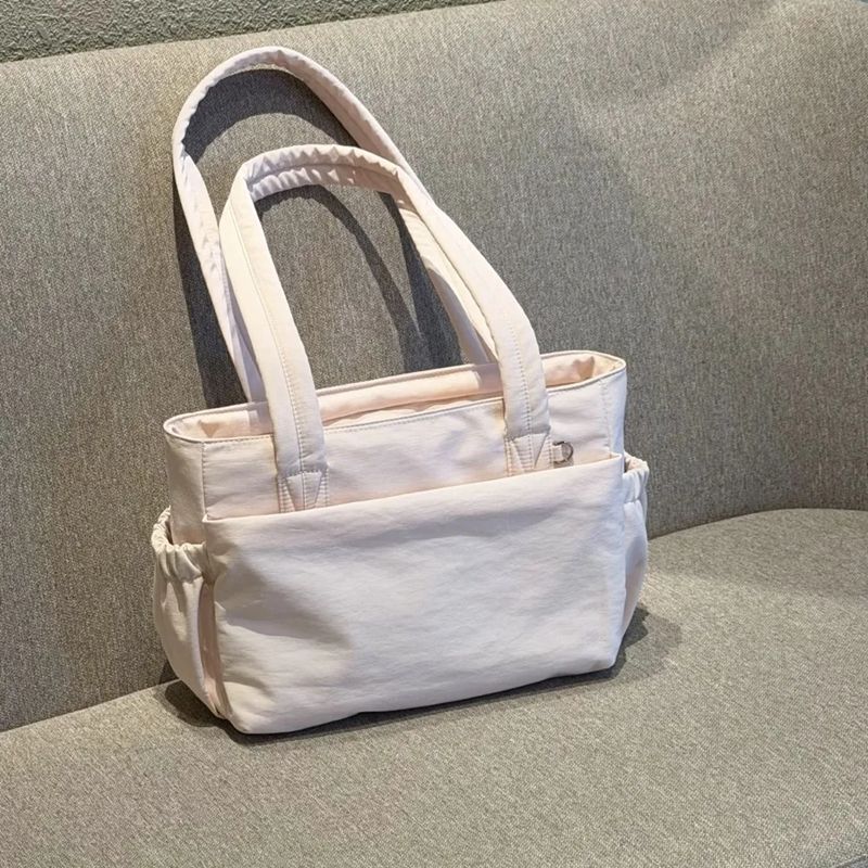 Cross-border gentle light pink commuter shoulder bag, lightweight and durable nylon fabric, lace large-capacity tote shoulder bag Cross-border gentle light pink commuter shoulder bag, lightweight and durable nylon fabric, lace large-capacity tote shoulder bag