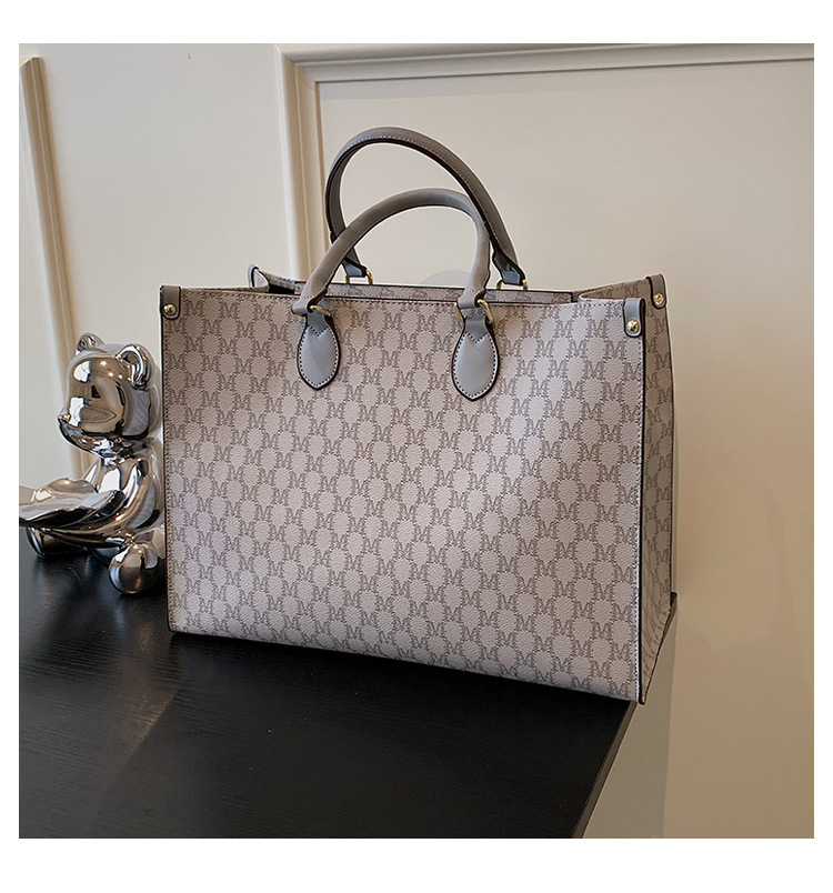 Women's Pu Leather Lattice Elegant Bucket Zipper Handbag display picture 1