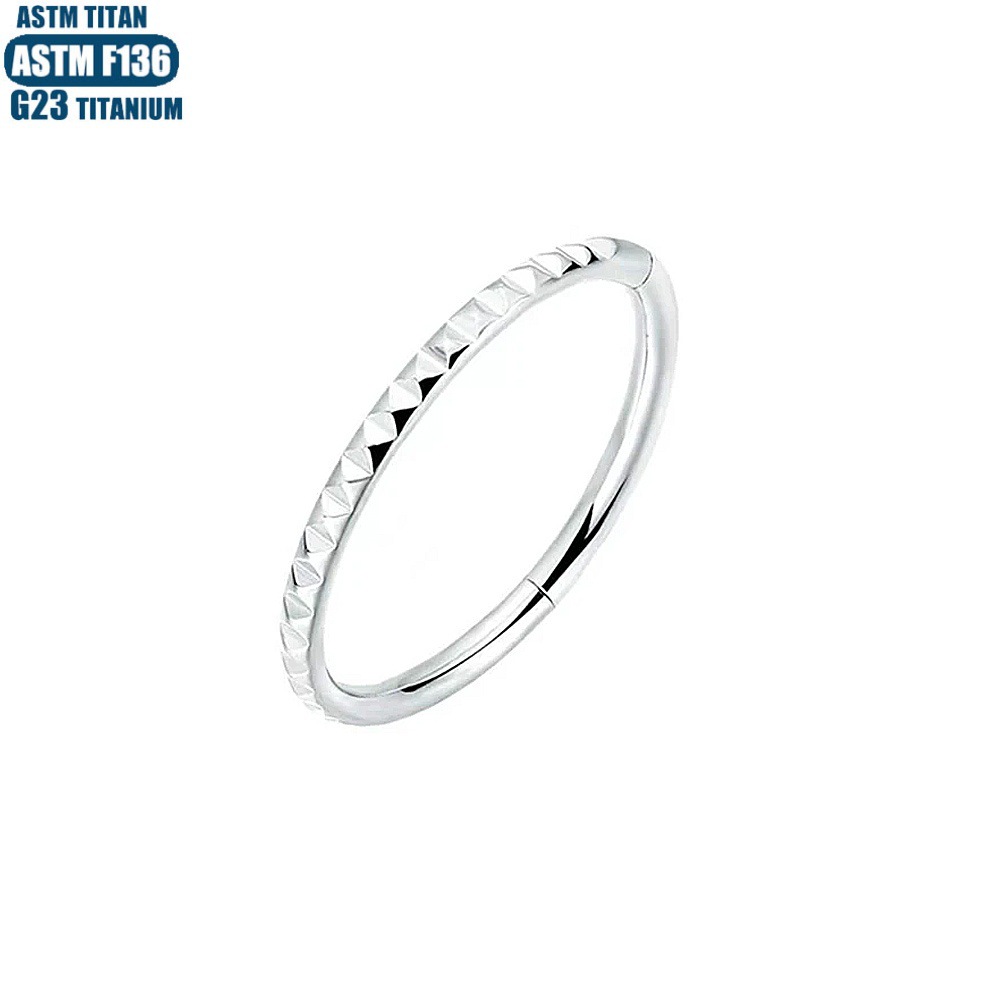 Silver pointed spike labret stud material detail
